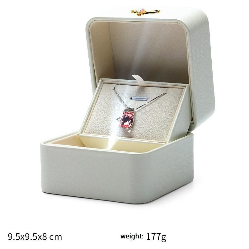 Kết thúc sáng tạo đèn phát sáng LED đính hôn Nhẫn hộp hiển thị Nhẫn đơn Anh dây chuyền Quần áo trang sức hộp quà hộp da PU